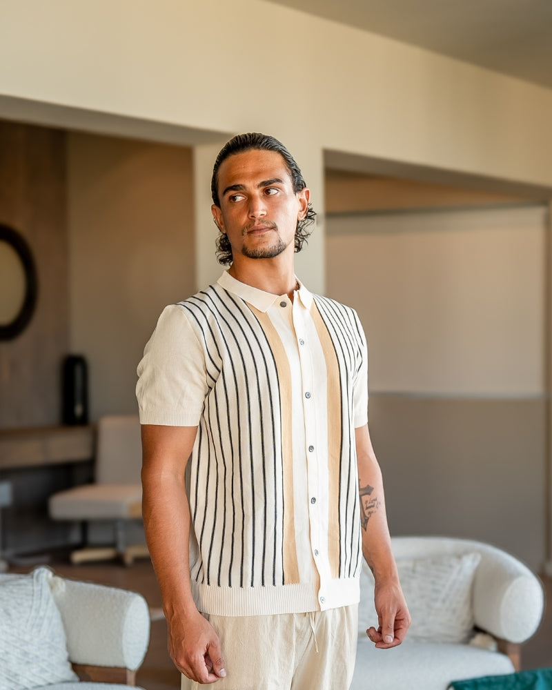 Polo tricot élégant à rayures intemporelles